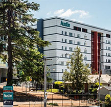 Austin Hospital Tower with trees in foreground