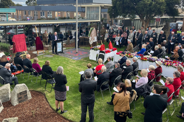 People gather in Remembrance Garden for Anzac Day service at Heidelberg Repatriation Hospital
