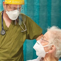Emergency care doctor with patient