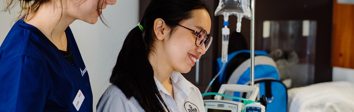 Student nurse with a staff member