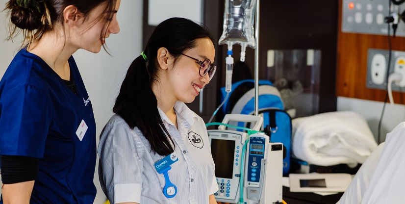 Student nurse with a staff member