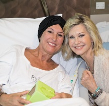 Dame Olivia Newton-John and a patient