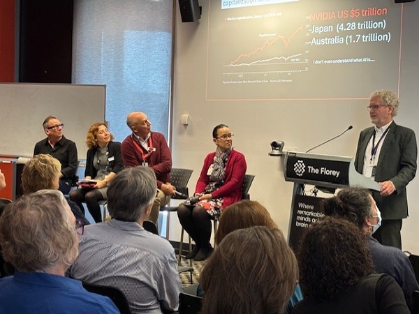 Prof Paul Johnson hosting the 'AI in Action at Austin Health' panel featuring (L-R) Prof David Berlowitz, Mozdeh Dehghani, Alan Pritchard and A/Prof Natasha Holmes