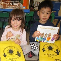 Liam and Harriet with their Children's Day 2022 bag