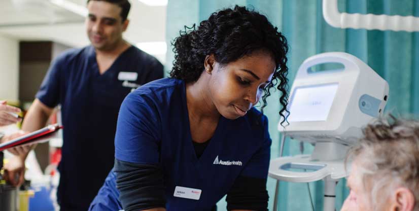 A nurse treats a patient in the Emergency Department