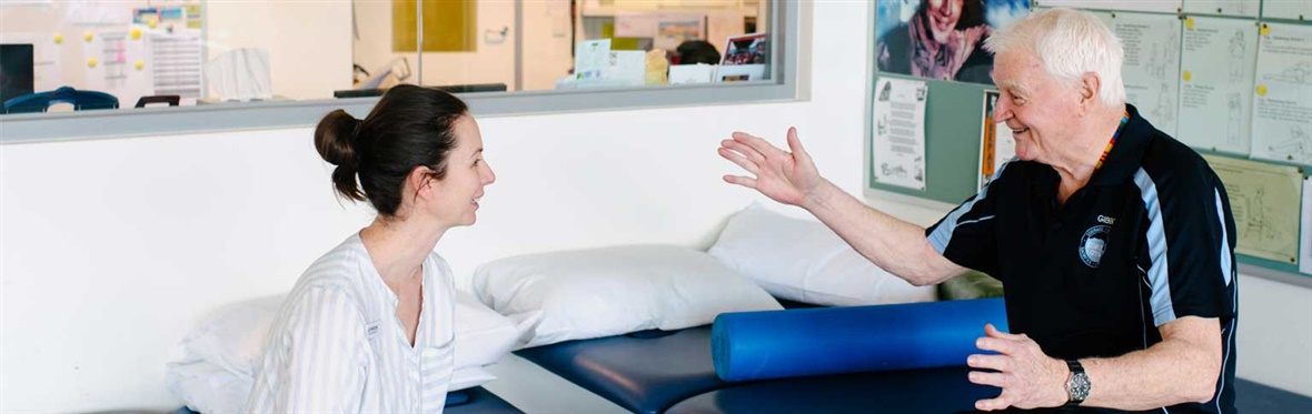 A physiotherapist and patient in the Kokoda Gym at Heidelberg Repatriation Hospital